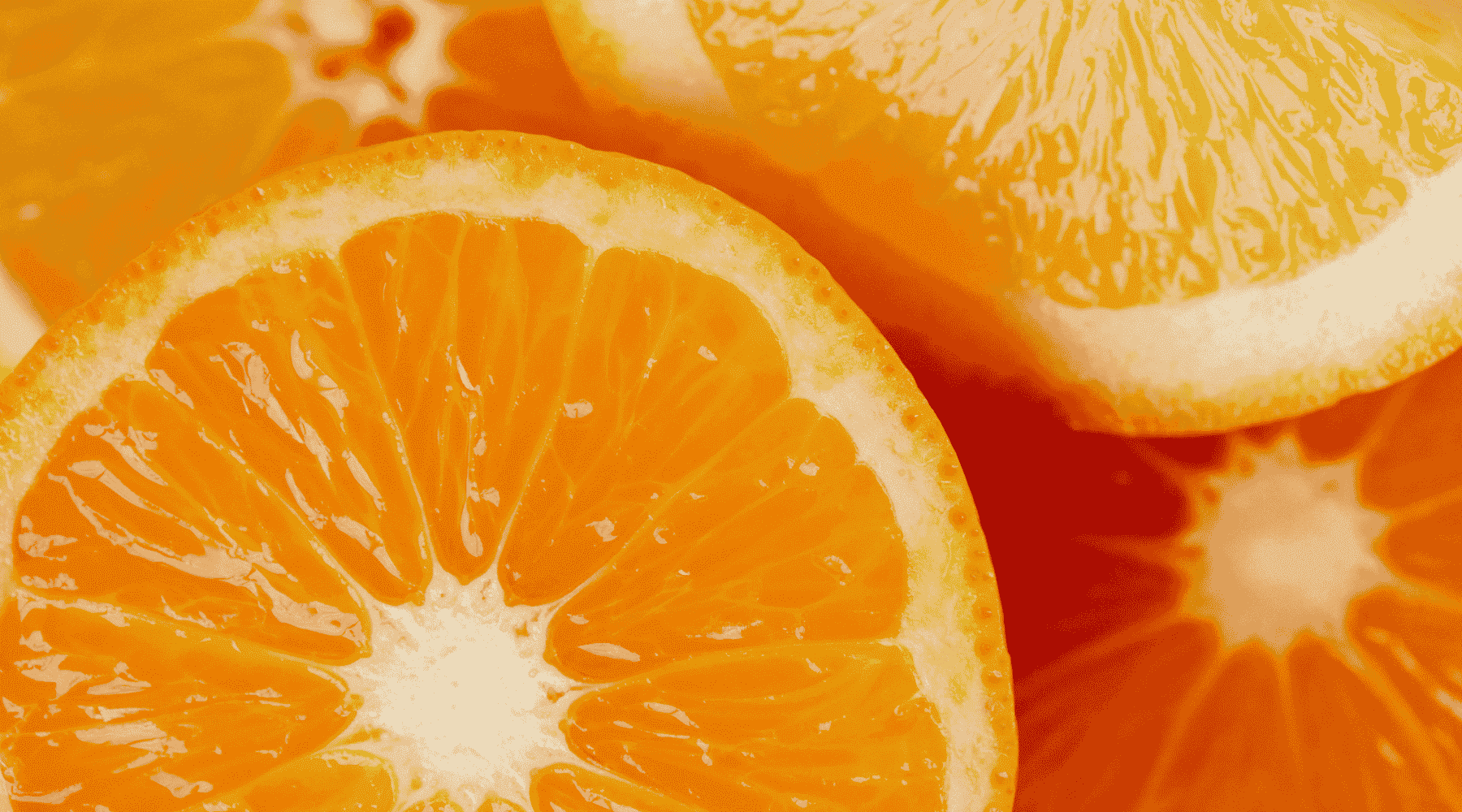 Group of bright juicy oranges cut in halves