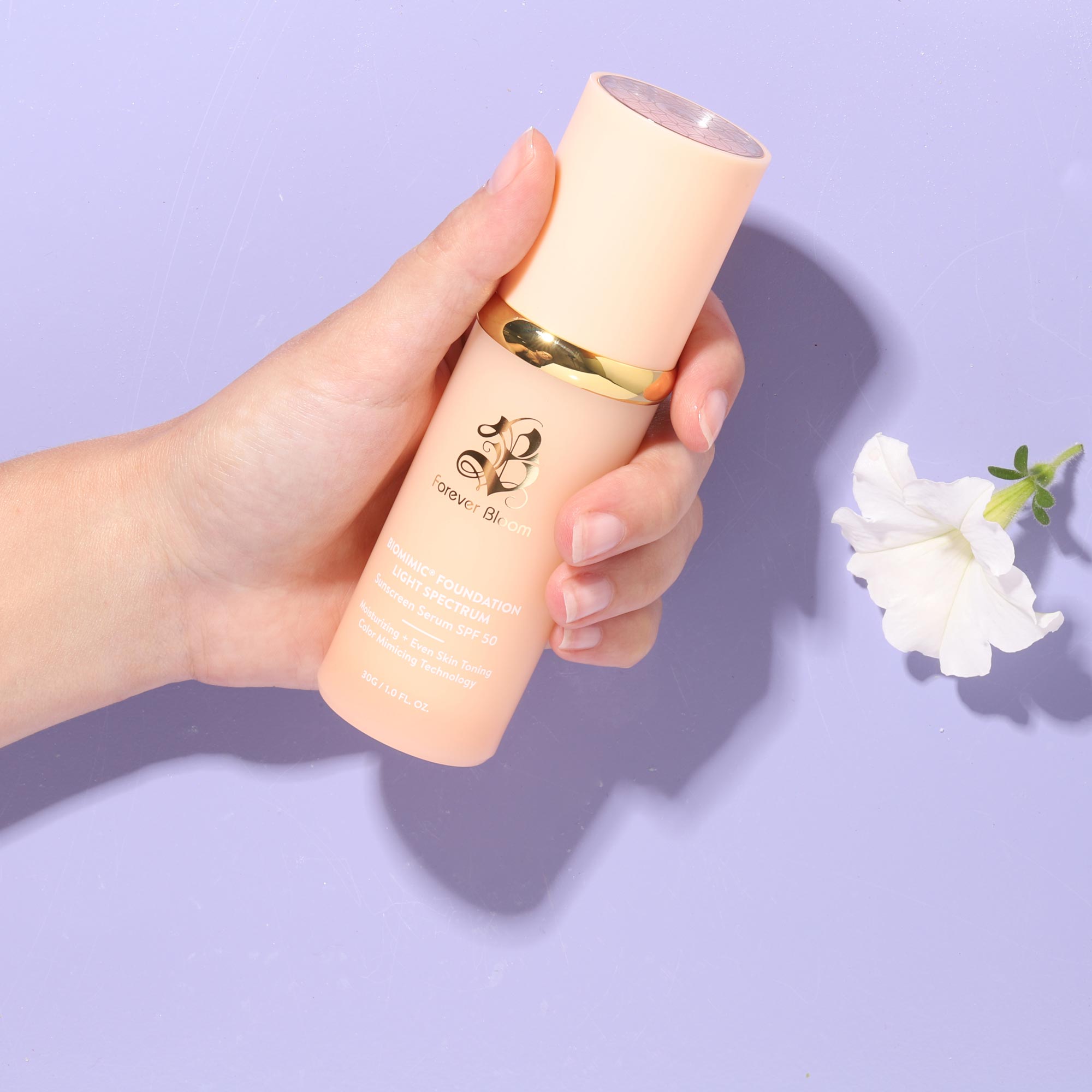Forever Bloom Biomimic Foundation Light Spectrum SPF 50 bottle for mature skin