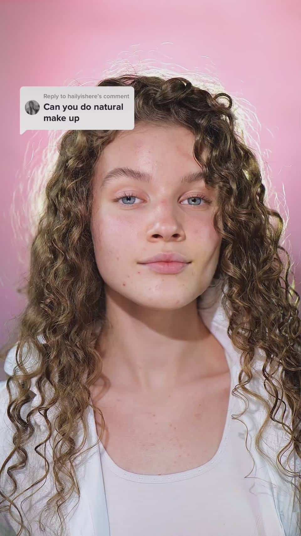 Woman demonstrating a natural makeup look using BioMimic foundation